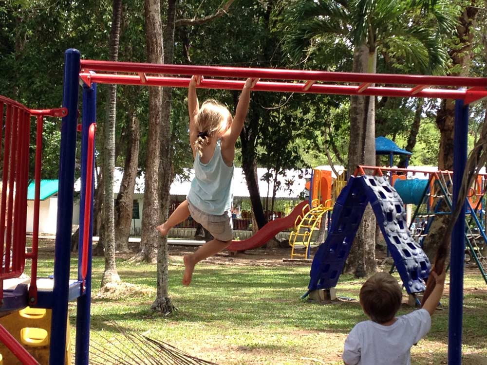 Climbing action at playground Phuket town